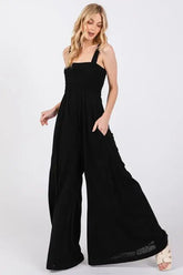 Black Smocked Flowy Wide Leg Jumpsuit, Jumpsuits, $ 49.00, A Moment Of Now™