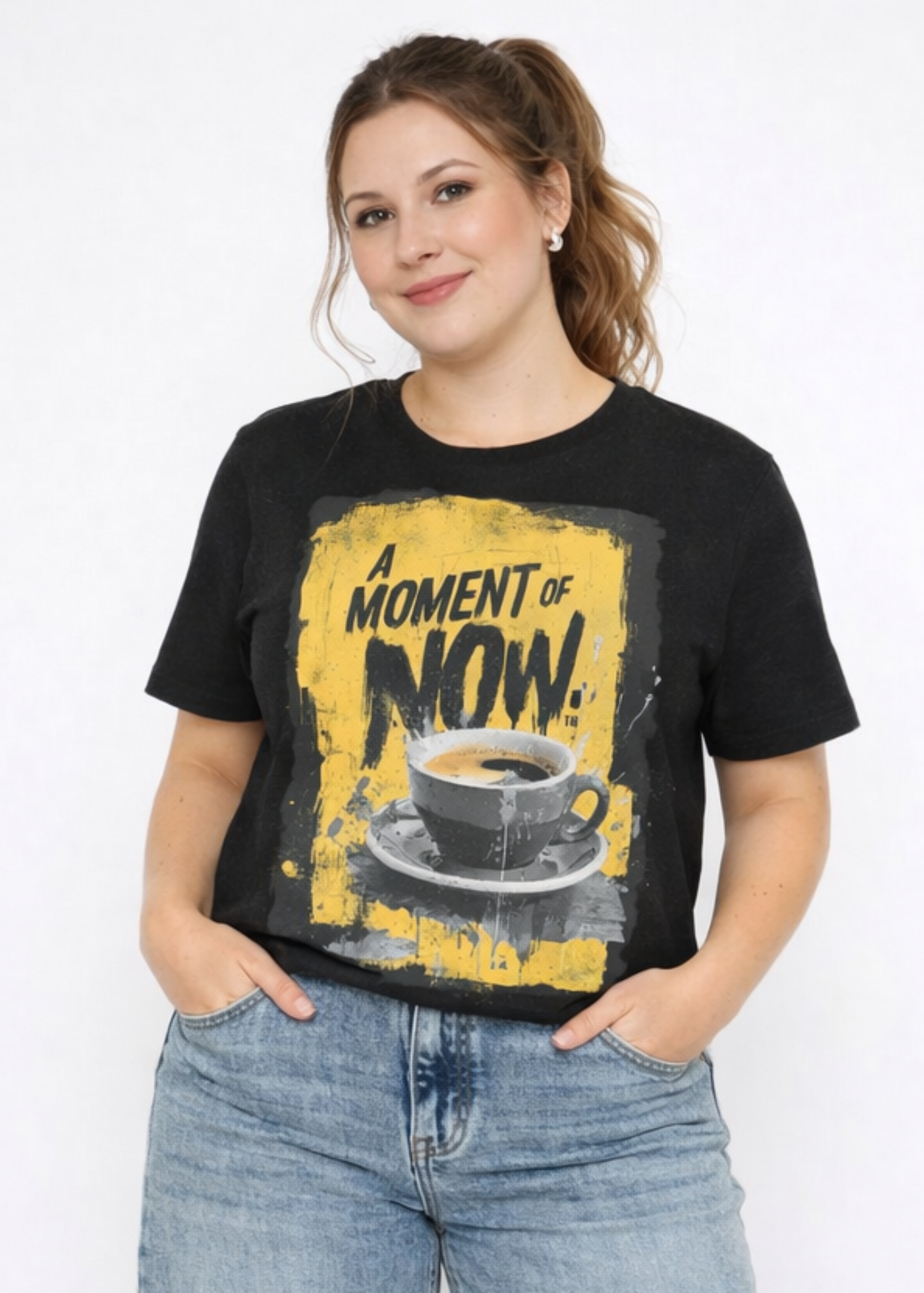 Woman wearing a black t-shirt with a graphic design and blue jeans on a white background