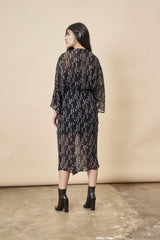 Stylized Feather Twisted Midi in Black + White | Boutique In USA, Dresses, $ 160.00, A Moment Of Now™