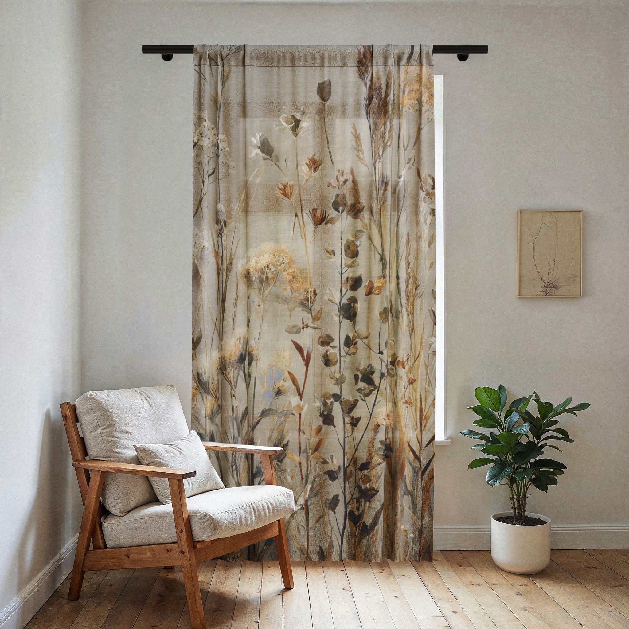 Close view of neutral dried wildflower print on a sheer voile curtain panel