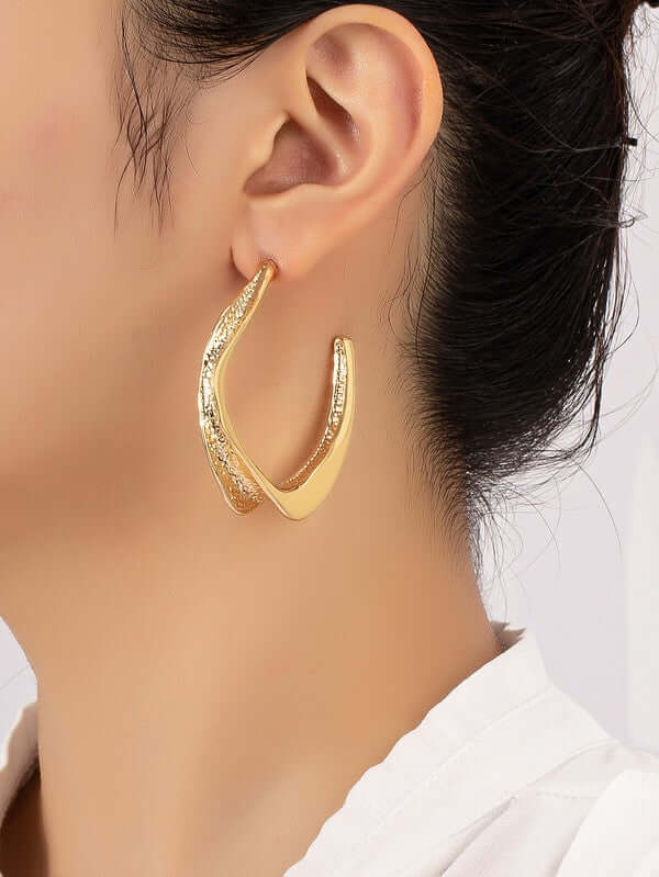 Shop Twisted metal hoop earrings, Earrings, USA Boutique