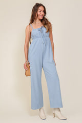 Shop Denim Blue Sleeveless Jumpsuit with Waist Tie, Jumpsuits & Rompers, USA Boutique