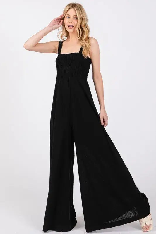 Black Smocked Flowy Wide Leg Jumpsuit, Jumpsuits, $ 49.00, A Moment Of Now™