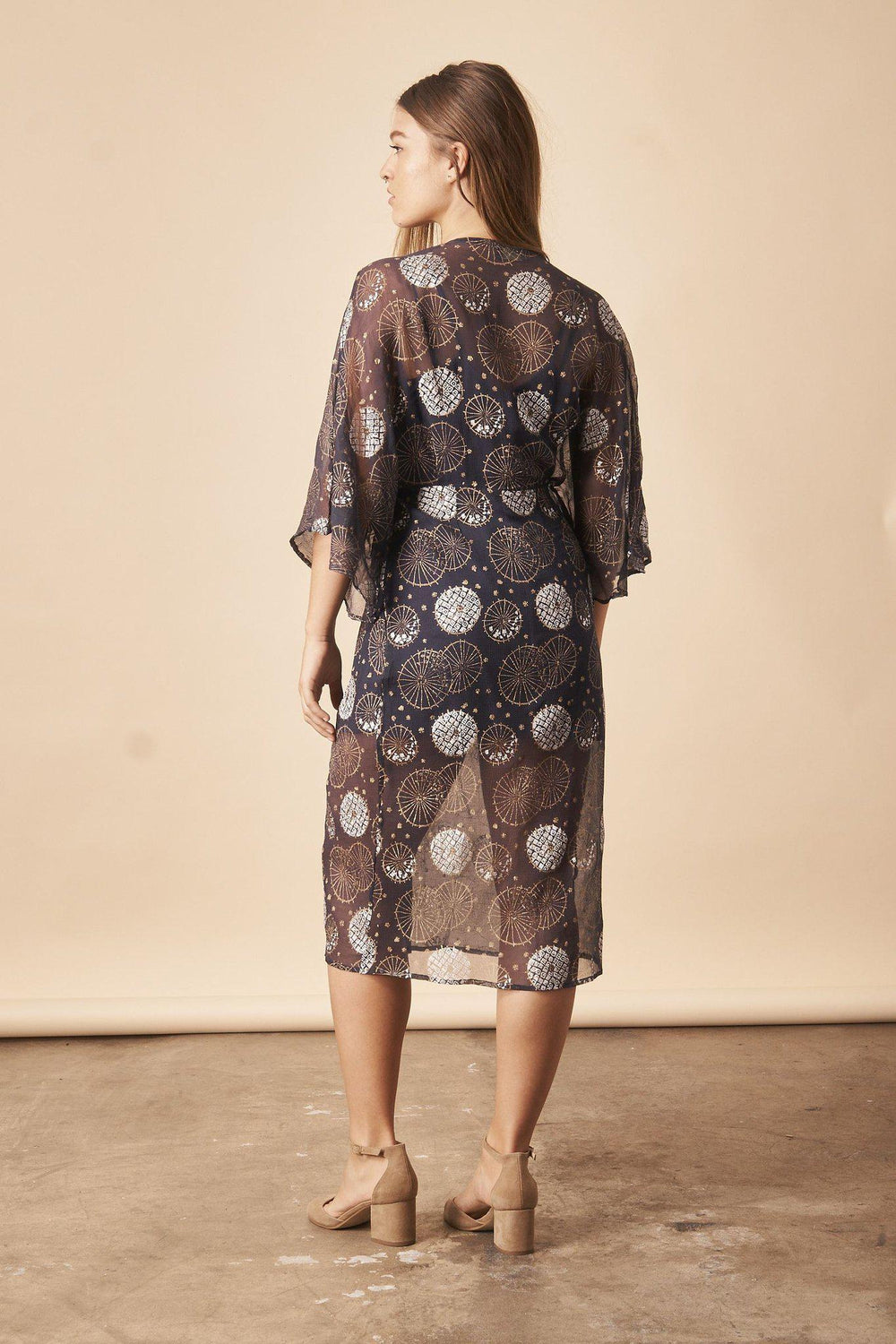 Dancing Umbrellas Twisted Midi Dress in Navy + Metallic | Boutique In USA, Dresses, $ 180.00, A Moment Of Now™