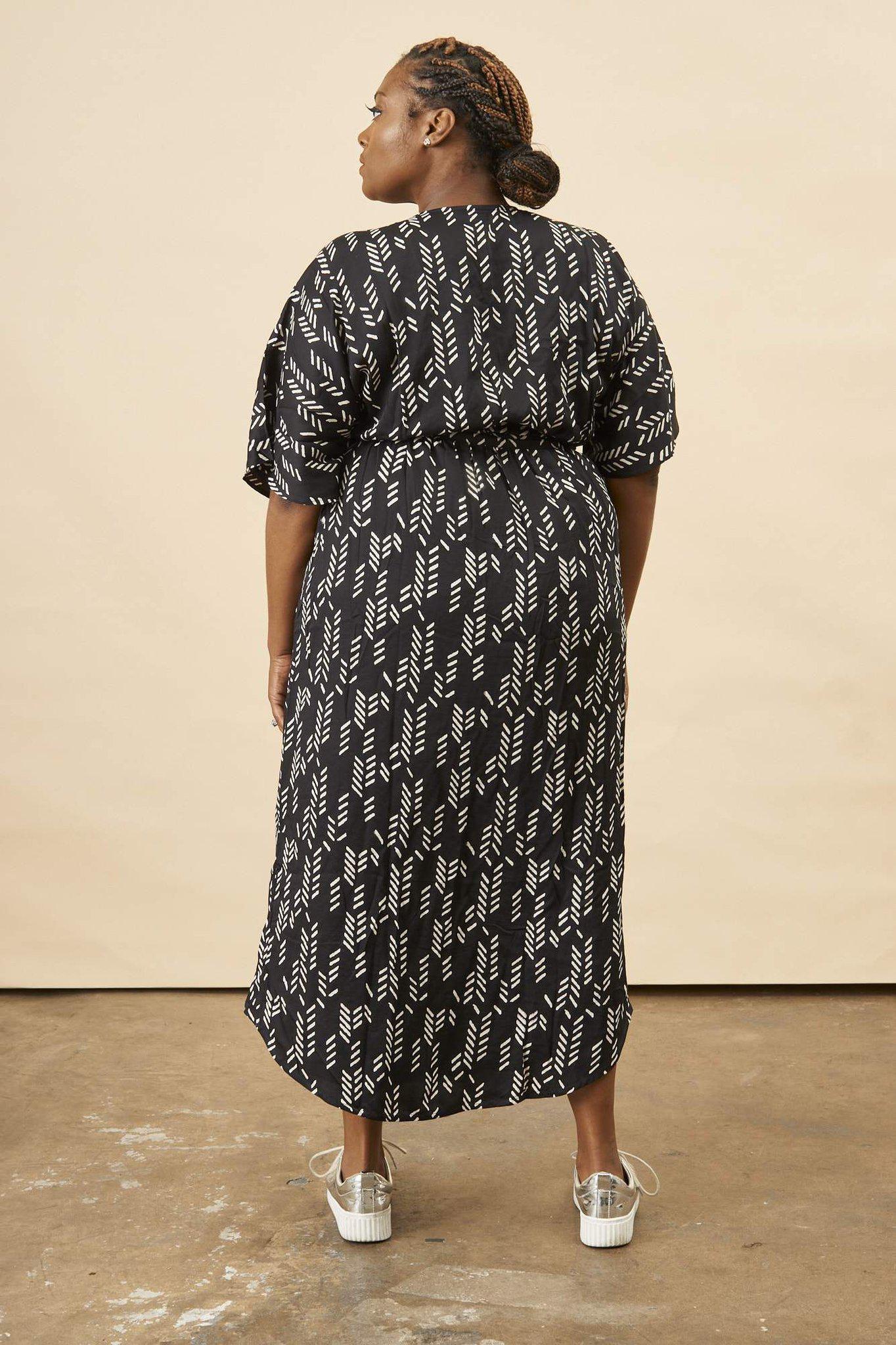 Stylized Feather Wrap Dress in Black + Cream | Boutique In USA, Dresses, $ 180.00, A Moment Of Now™