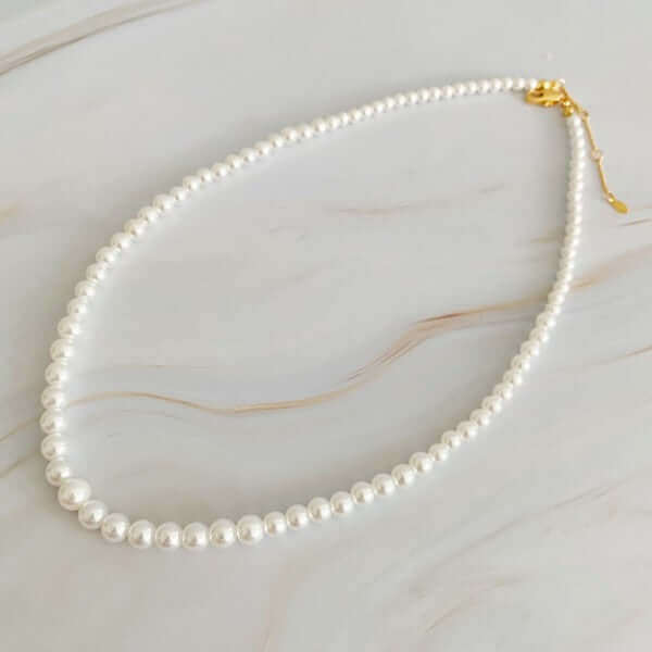 Queen Liz Graduated Pearl Necklace, Ellison and Young, $ 56.95