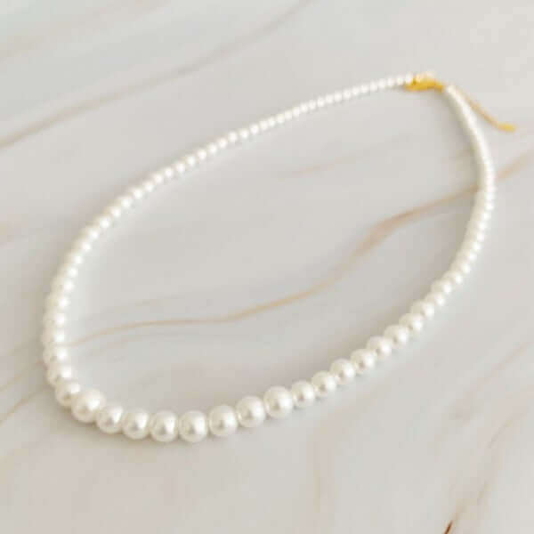 Queen Liz Graduated Pearl Necklace, Ellison and Young, $ 56.95