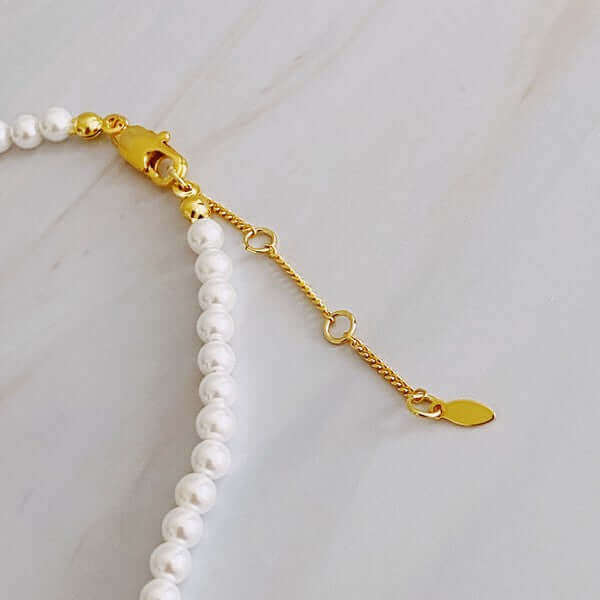 Queen Liz Graduated Pearl Necklace, Ellison and Young, $ 56.95