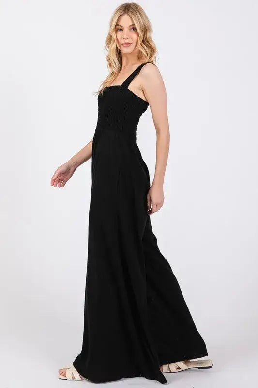 Black Smocked Flowy Wide Leg Jumpsuit, Jumpsuits, $ 49.00, A Moment Of Now™