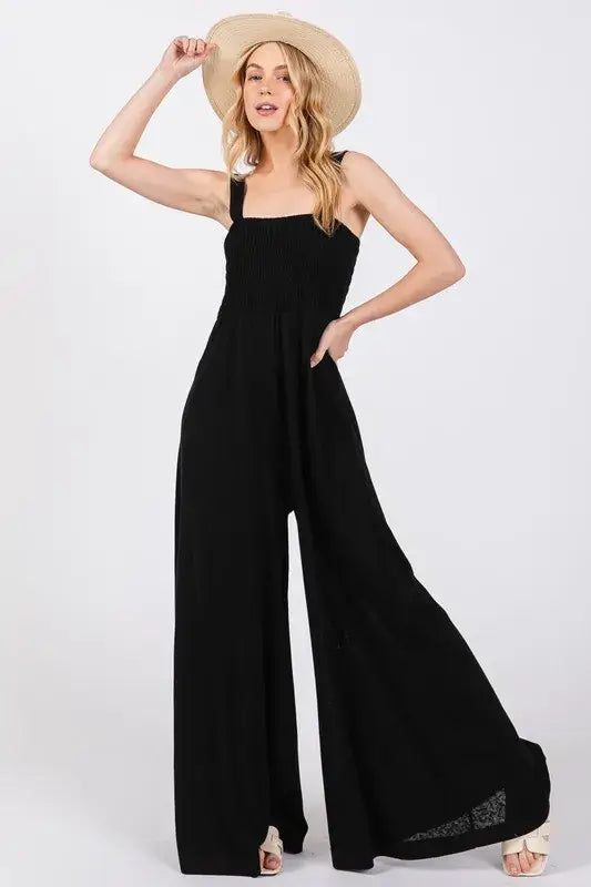 Black Smocked Flowy Wide Leg Jumpsuit, Jumpsuits, $ 49.00, A Moment Of Now™