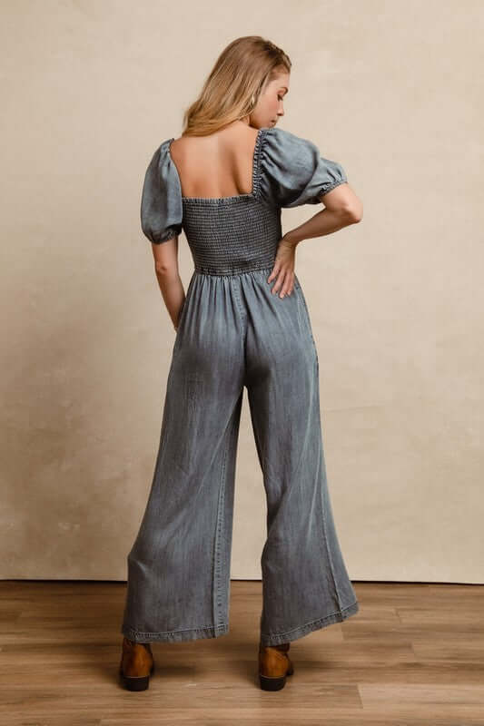 Blue Smocked Puff Sleeve Denim Jumpsuit, Jumpsuits, $ 89.00, A Moment Of Now™