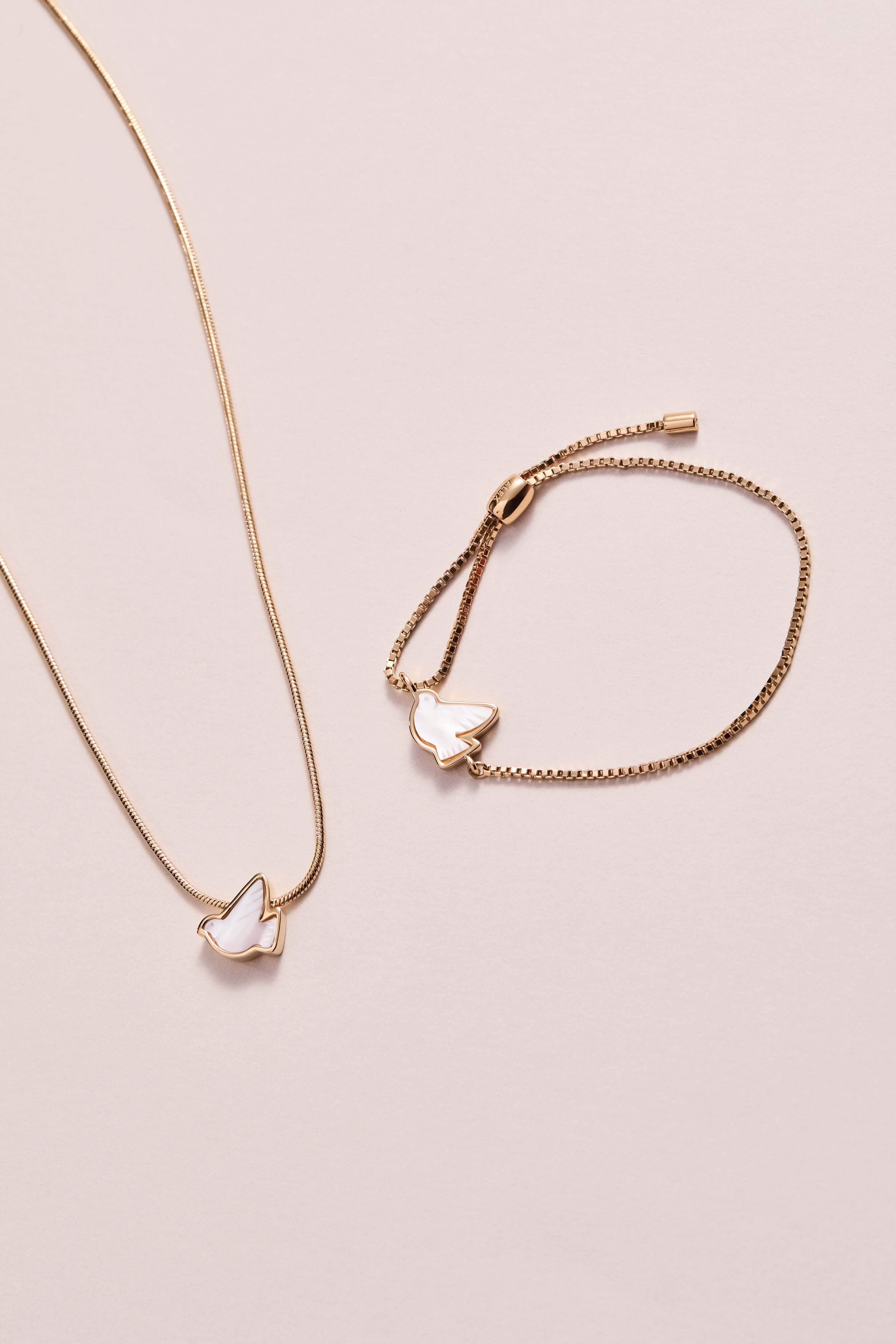 Pearlized Dove 'Peace' Slider Necklace, Necklaces, $ 44.00, A Moment Of Now™