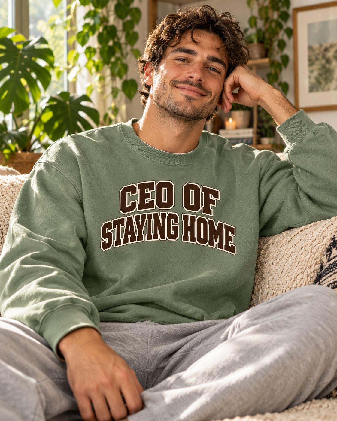 CEO of Staying Home varsity sweatshirt lifestyle photo
