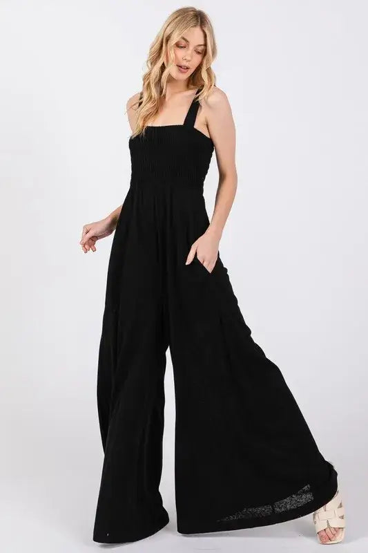 Black Smocked Flowy Wide Leg Jumpsuit, Jumpsuits, $ 49.00, A Moment Of Now™