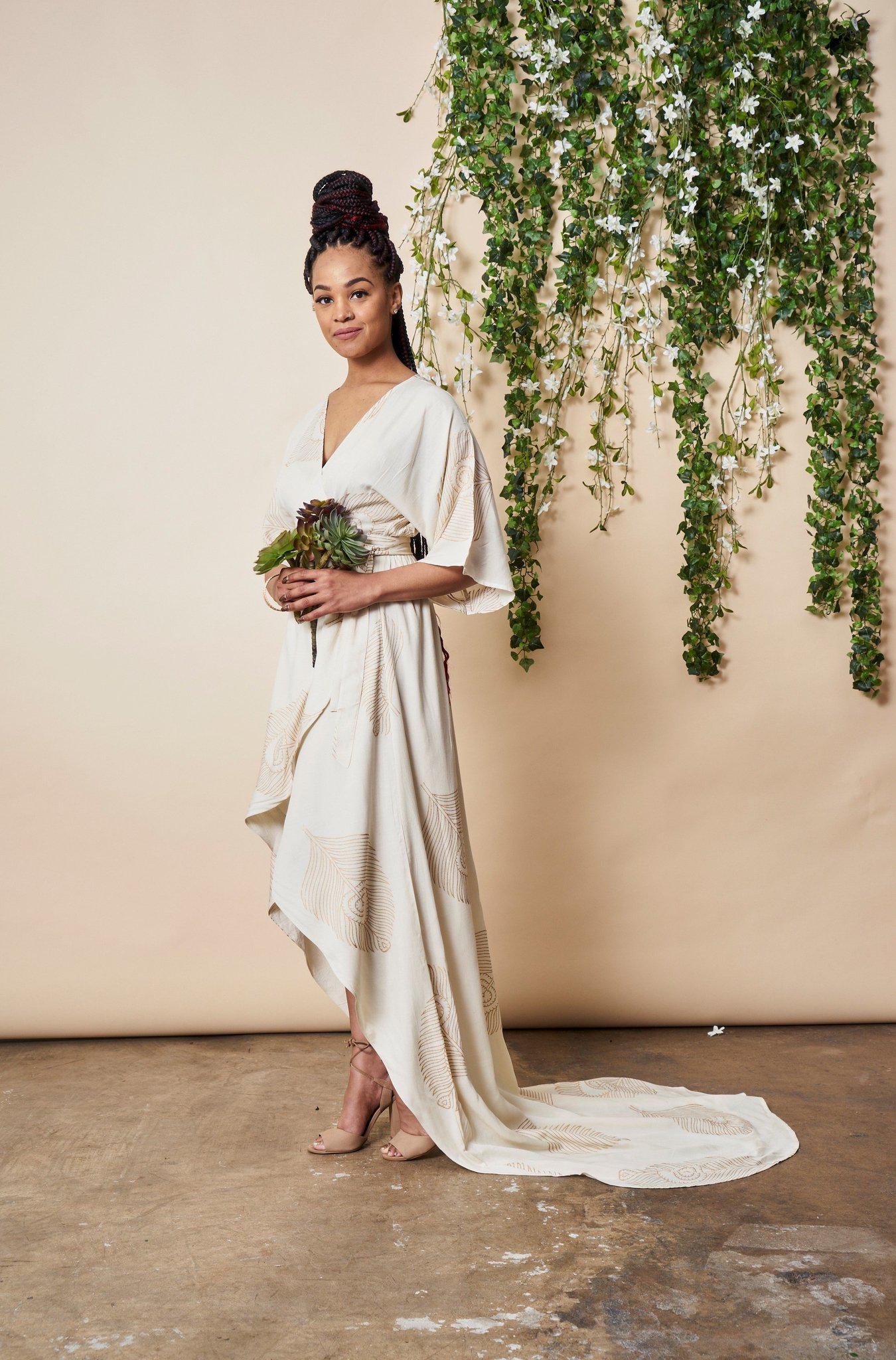 Peacock Feather Maxi Wrap Dress W/ Train in Cream + Gold | Boutique In USA, Wedding Dress, $ 425.00, A Moment Of Now™