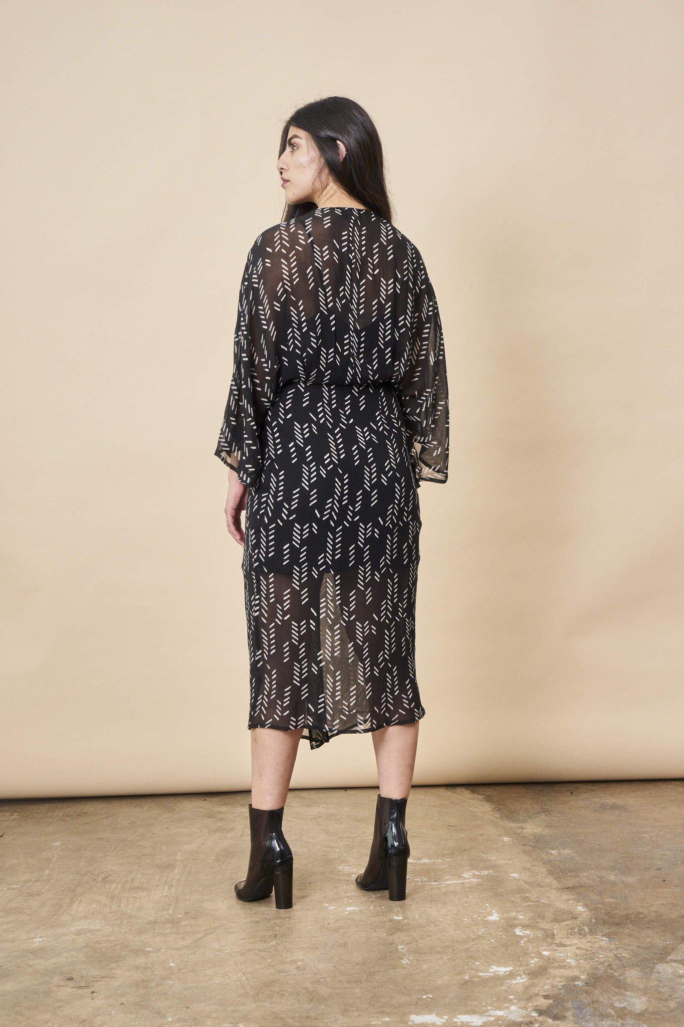 Stylized Feather Twisted Midi in Black + White | Boutique In USA, Dresses, $ 160.00, A Moment Of Now™